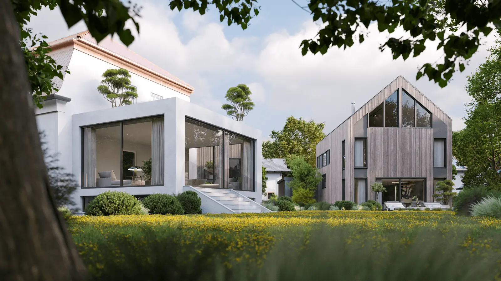 Modern homes with large windows and minimalist design surrounded by trees and grass on a sunny day.